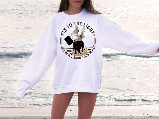 Fly to the light but don't burn your wings crewneck sweater