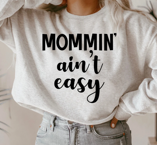 Mommin' ain't easy crewneck sweater